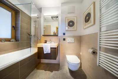 Ein Badezimmer in der Unterkunft Nationalpark Chalet Grossschober