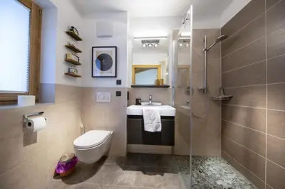 Ein Badezimmer in der Unterkunft Nationalpark Chalet Grossschober