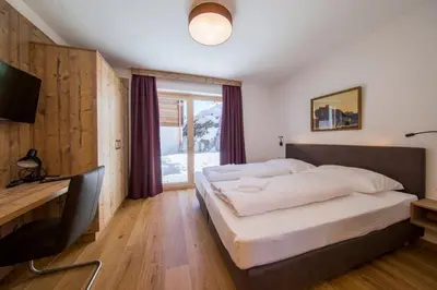 Ein Bett oder Betten in einem Zimmer der Unterkunft Nationalpark Chalet Quirl