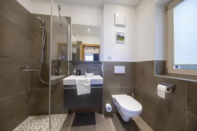 Ein Badezimmer in der Unterkunft Nationalpark Chalet Pillewizer
