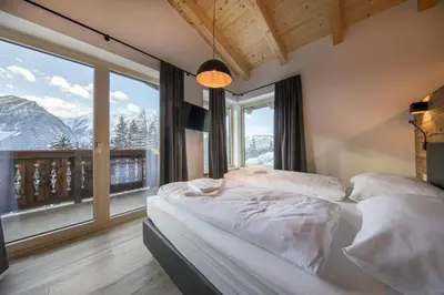 Ein Bett oder Betten in einem Zimmer der Unterkunft Nationalpark Chalet Hohes Aderl