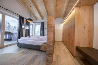 Ein Bett oder Betten in einem Zimmer der Unterkunft Nationalpark Chalet Hohes Aderl