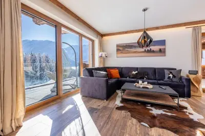 Ein Sitzbereich in der Unterkunft Nationalpark Chalet Goldbergspitze