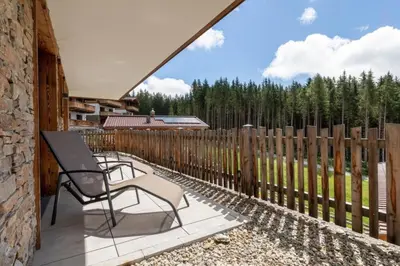 Ein Balkon oder eine Terrasse in der Unterkunft Nationalpark Chalet Goldbergspitze