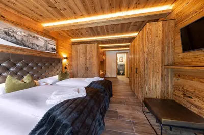 Ein Bett oder Betten in einem Zimmer der Unterkunft Nationalpark Chalet Vorderkopf