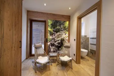Ein Sitzbereich in der Unterkunft Nationalpark Chalet Dreiherrenspitze