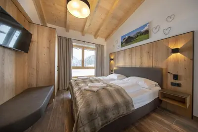 Ein Bett oder Betten in einem Zimmer der Unterkunft Nationalpark Chalet Habachspitze