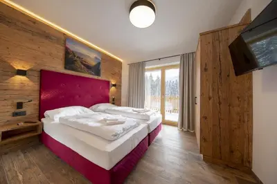 Ein Bett oder Betten in einem Zimmer der Unterkunft Nationalpark Chalet Habachspitze