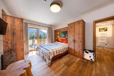 Ein Bett oder Betten in einem Zimmer der Unterkunft Nationalpark Chalet Habachspitze