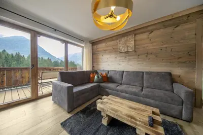 Ein Sitzbereich in der Unterkunft Nationalpark Chalet Grosser Happ