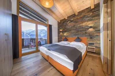 Ein Bett oder Betten in einem Zimmer der Unterkunft Nationalpark Chalet Seespitze