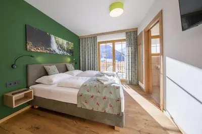 Ein Bett oder Betten in einem Zimmer der Unterkunft Nationalpark Chalet Seespitze