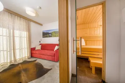 Ein Sitzbereich in der Unterkunft Nationalpark Chalet Seespitze