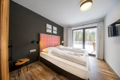 Ein Bett oder Betten in einem Zimmer der Unterkunft Nationalpark Chalet Daberspitze