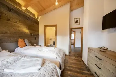 Ein Bett oder Betten in einem Zimmer der Unterkunft Nationalpark Chalet Hochalmspitze