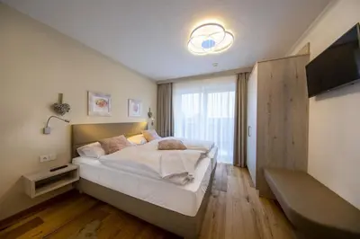 Ein Bett oder Betten in einem Zimmer der Unterkunft Nationalpark Chalet Törlspitze