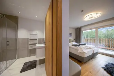 Ein Bett oder Betten in einem Zimmer der Unterkunft Nationalpark Chalet Törlspitze