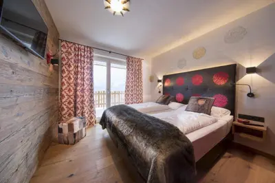 Ein Bett oder Betten in einem Zimmer der Unterkunft Nationalpark Chalet Hohe Warte