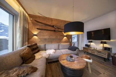 Ein Sitzbereich in der Unterkunft Nationalpark Chalet Lasörling