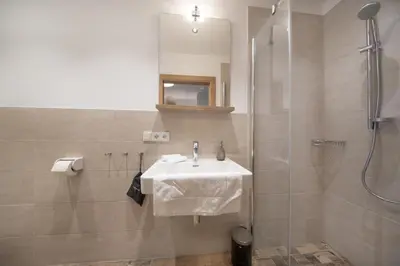 Ein Badezimmer in der Unterkunft Nationalpark Chalet Lasörling