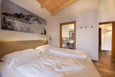 Ein Bett oder Betten in einem Zimmer der Unterkunft Nationalpark Chalet Lasörling