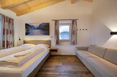 Ein Bett oder Betten in einem Zimmer der Unterkunft Nationalpark Chalet Lasörling