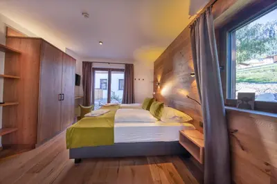 Ein Bett oder Betten in einem Zimmer der Unterkunft Nationalpark Chalet Grosser Geiger