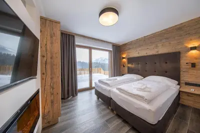 Ein Bett oder Betten in einem Zimmer der Unterkunft Nationalpark Chalet Wildenkogel