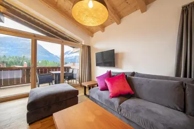 Ein Sitzbereich in der Unterkunft Nationalpark Chalet Löffelspitze