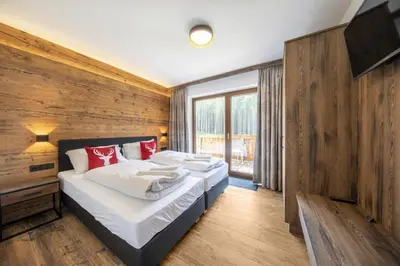 Ein Bett oder Betten in einem Zimmer der Unterkunft Nationalpark Chalet Kratzenberg