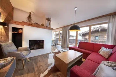 Ein Sitzbereich in der Unterkunft Nationalpark Chalet Kreuzspitze