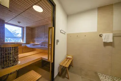 Ein Bett oder Betten in einem Zimmer der Unterkunft Nationalpark Chalet Hoher Sonnblick