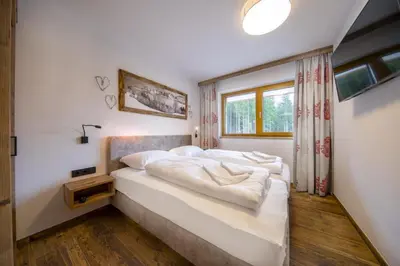 Ein Bett oder Betten in einem Zimmer der Unterkunft Nationalpark Chalet Malhamhorn