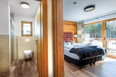 Ein Bett oder Betten in einem Zimmer der Unterkunft Nationalpark Chalet Ochsenbug