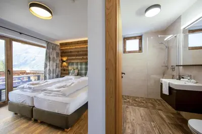 Ein Bett oder Betten in einem Zimmer der Unterkunft Nationalpark Chalet Ochsenbug
