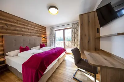 Ein Bett oder Betten in einem Zimmer der Unterkunft Nationalpark Chalet Edelweissspitze