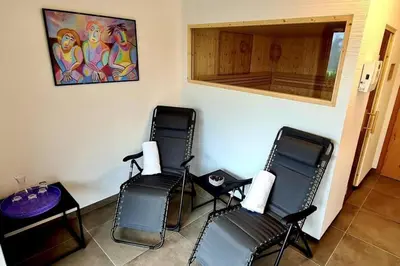 Ein Sitzbereich in der Unterkunft Nationalpark Chalet Edelweissspitze