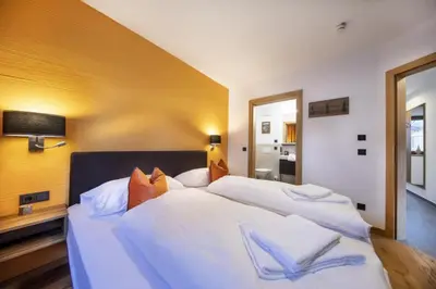 Ein Bett oder Betten in einem Zimmer der Unterkunft Nationalpark Chalet Käferfeldeck