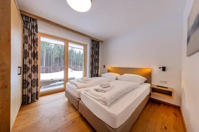 Ein Bett oder Betten in einem Zimmer der Unterkunft Nationalpark Chalet Achkogel