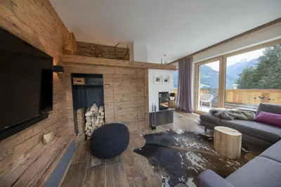 Ein Sitzbereich in der Unterkunft Nationalpark Chalet Rosenspitze