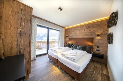 Ein Bett oder Betten in einem Zimmer der Unterkunft Nationalpark Chalet Kuhhaut