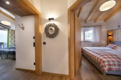 Ein Bett oder Betten in einem Zimmer der Unterkunft Nationalpark Chalet Hohe Warte 2