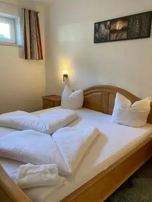 Ein Bett oder Betten in einem Zimmer der Unterkunft Ferienwohnung