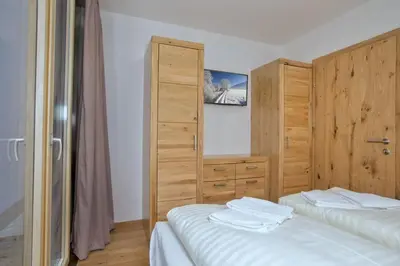 Ein Bett oder Betten in einem Zimmer der Unterkunft Residenz Wildkogelbahnen Top 1