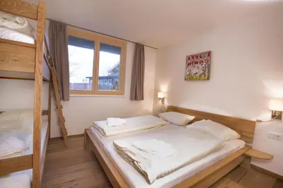 Ein Bett oder Betten in einem Zimmer der Unterkunft Residenz Wildkogelbahnen Top 2