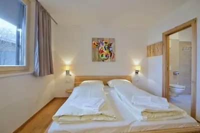 Ein Bett oder Betten in einem Zimmer der Unterkunft Residenz Wildkogelbahnen Top 2