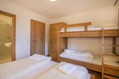 Ein Bett oder Betten in einem Zimmer der Unterkunft Residenz Wildkogelbahnen Top 2