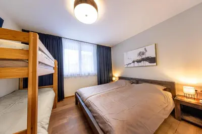 Ein Bett oder Betten in einem Zimmer der Unterkunft Residenz Wildkogelbahnen Top 3