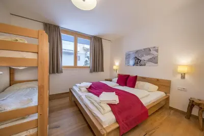 Ein Bett oder Betten in einem Zimmer der Unterkunft Residenz Wildkogelbahnen Top 8