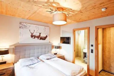 Ein Bett oder Betten in einem Zimmer der Unterkunft Residenz Wildkogelbahnen Top 9